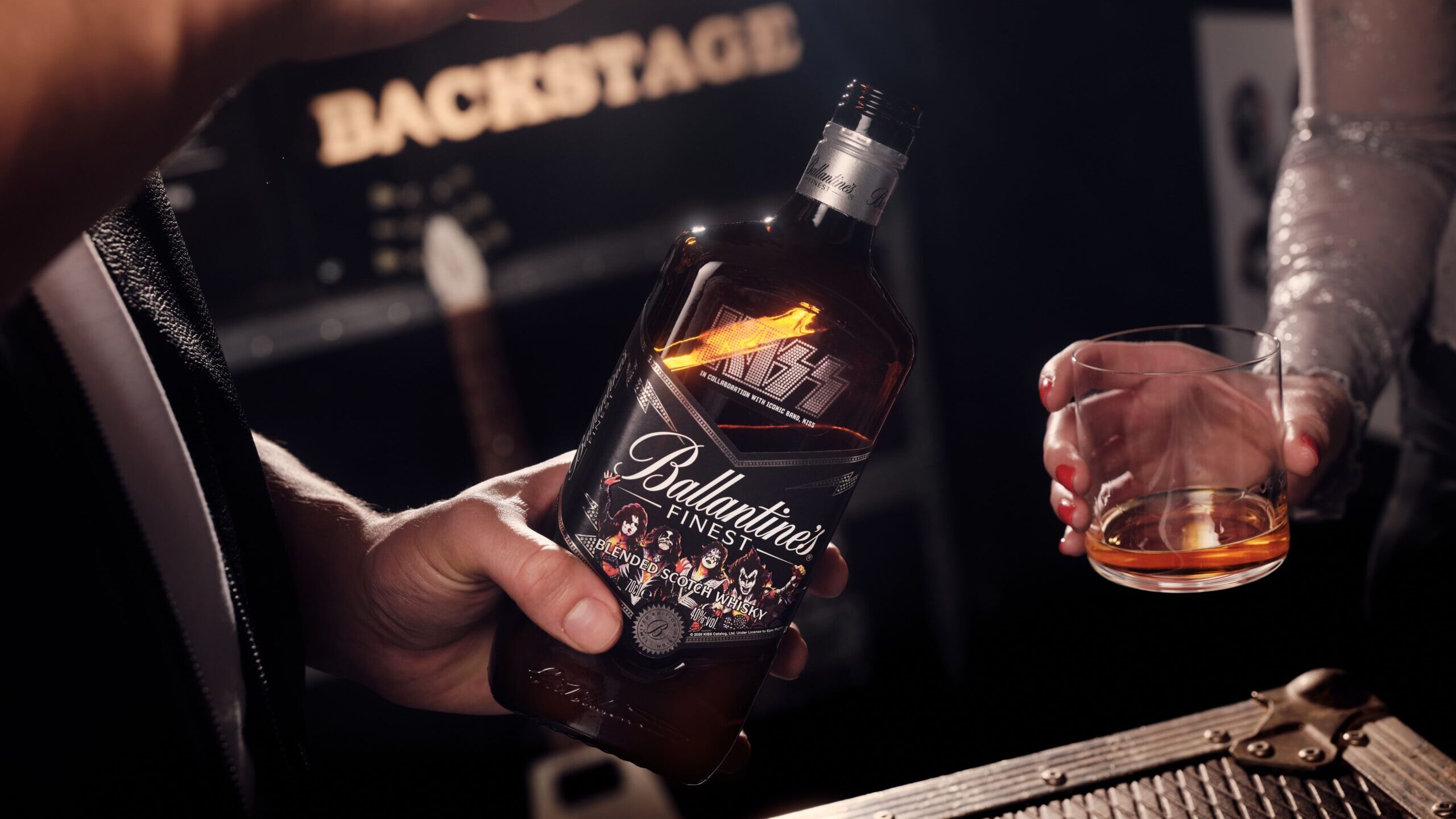 Ballantine's x Kiss pouring a drink