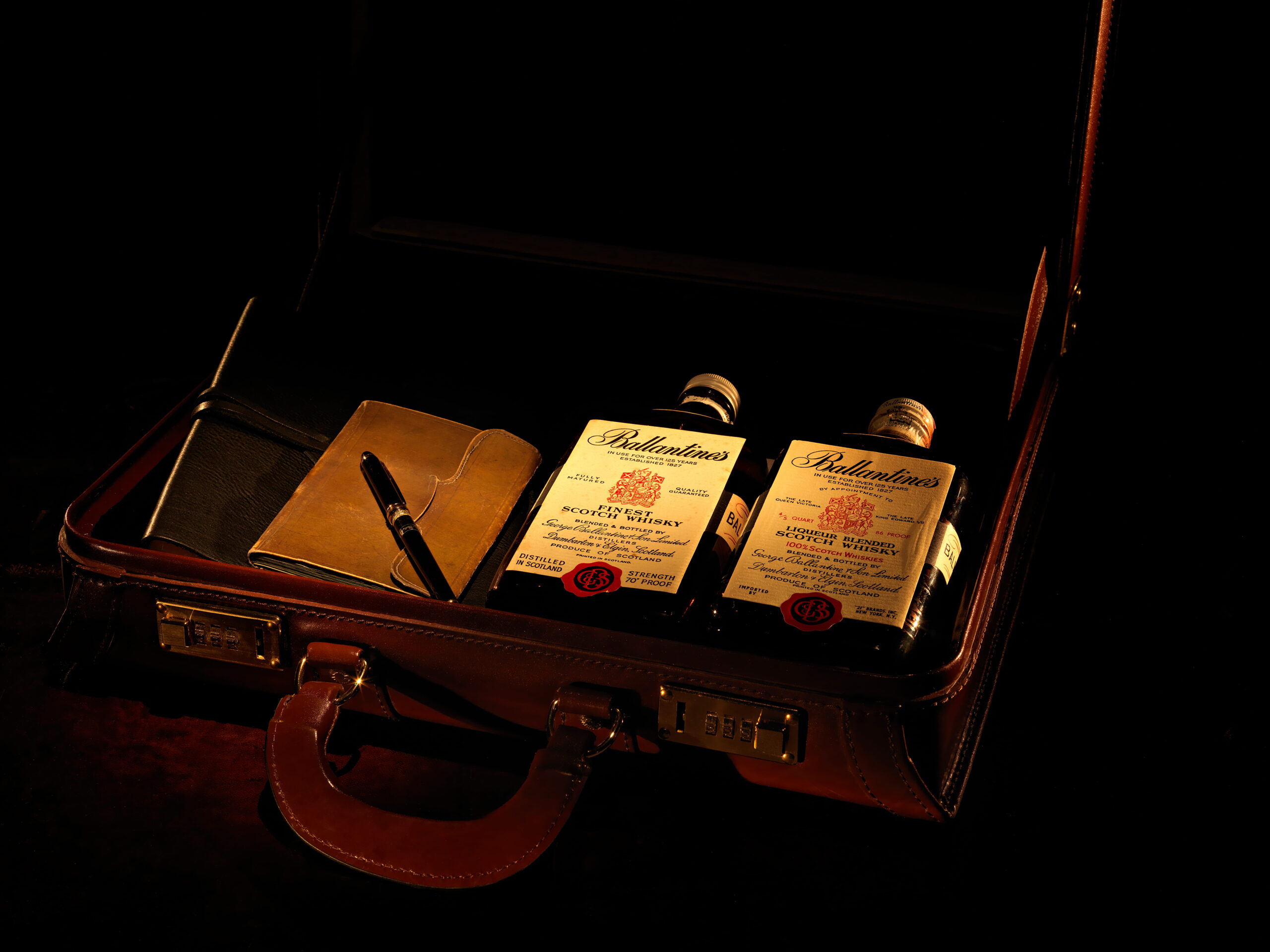Ballantine's bottles in briefcase